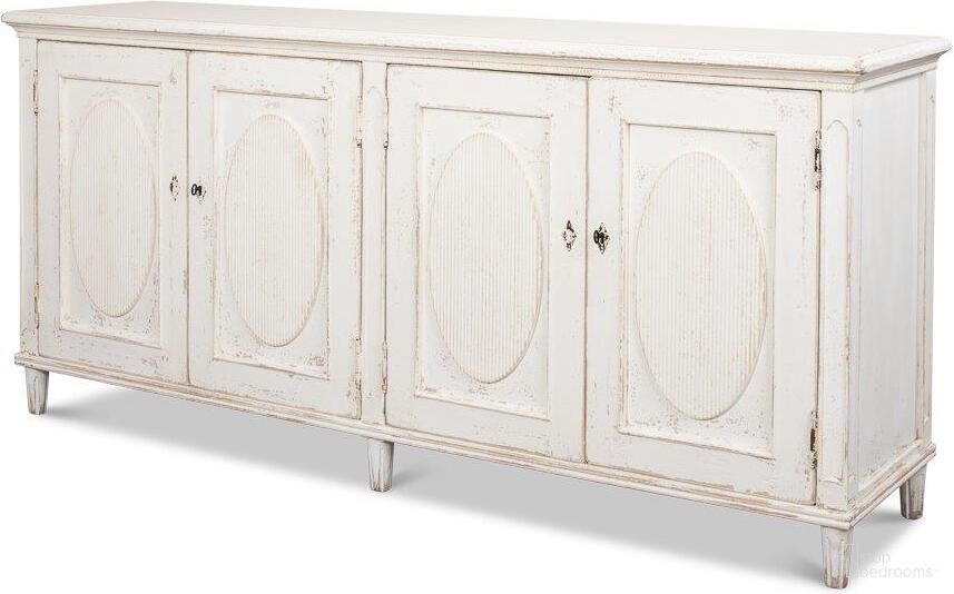 The appearance of Ribbon White Sideboard designed by Sarreid in the coastal interior design. This white piece of furniture was selected by 1StopBedrooms from Ribbon Collection to add a touch of cosiness and style into your home. Sku: 40381.
