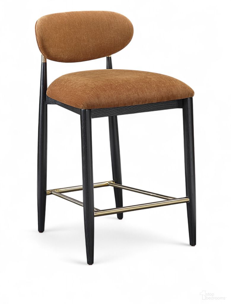The appearance of Riccio Performance Fabric Upholstered Stool In Cognac and Stained Black designed by Meridian in the modern / contemporary interior design. This cognac/stained black piece of furniture  was selected by 1StopBedrooms from Riccio Collection to add a touch of cosiness and style into your home. Sku: 11042Cognac-C. Material: Polyester.