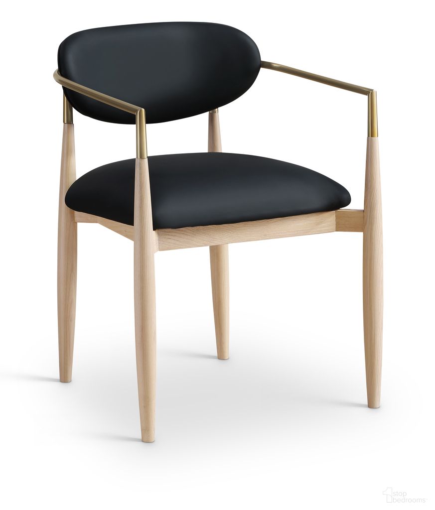 The appearance of Riccio Vegan Leather Upholstered Dining Arm Chair Set of 2 In Black and Stained Natural designed by Meridian in the modern / contemporary interior design. This black/stained natural piece of furniture was selected by 1StopBedrooms from Riccio Collection to add a touch of cosiness and style into your home. Sku: 11010Black-AC. Chair Type: Arm Chair. Material: Vegan Leather.