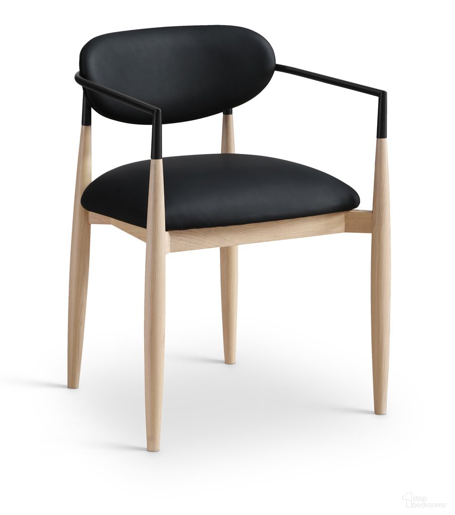 The appearance of Riccio Vegan Leather Upholstered Dining Arm Chair Set of 2 In Black and Stained Natural designed by Meridian in the modern / contemporary interior design. This black/stained natural piece of furniture was selected by 1StopBedrooms from Riccio Collection to add a touch of cosiness and style into your home. Sku: 11019Black-AC. Chair Type: Arm Chair. Material: Vegan Leather.