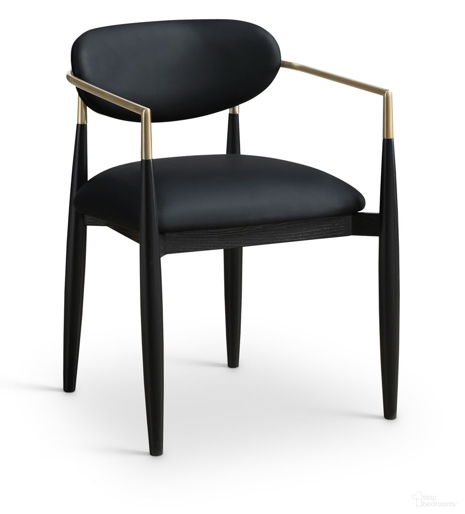 The appearance of Riccio Vegan Leather Upholstered Dining Arm Chair Set of 2 In Black designed by Meridian in the modern / contemporary interior design. This black piece of furniture  was selected by 1StopBedrooms from Riccio Collection to add a touch of cosiness and style into your home. Sku: 11017Black-AC. Chair Type: Arm Chair. Material: Vegan Leather.