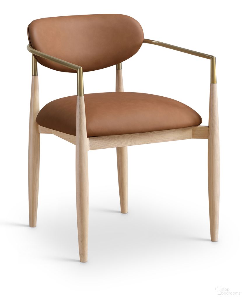 The appearance of Riccio Vegan Leather Upholstered Dining Arm Chair Set of 2 In Cognac and Stained Natural designed by Meridian in the modern / contemporary interior design. This cognac/stained natural piece of furniture was selected by 1StopBedrooms from Riccio Collection to add a touch of cosiness and style into your home. Sku: 11010Cognac-AC. Chair Type: Arm Chair. Material: Vegan Leather.
