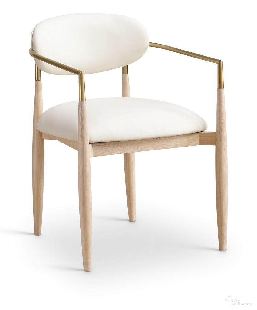 The appearance of Riccio Vegan Leather Upholstered Dining Arm Chair Set of 2 In Cream and Stained Natural designed by Meridian in the modern / contemporary interior design. This cream/stained natural piece of furniture was selected by 1StopBedrooms from Riccio Collection to add a touch of cosiness and style into your home. Sku: 11010Cream-AC. Chair Type: Arm Chair. Material: Vegan Leather.