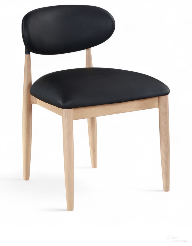 The appearance of Riccio Vegan Leather Upholstered Dining Side Chair Set of 2 In Black and Stained Natural designed by Meridian in the modern / contemporary interior design. This black/stained natural piece of furniture was selected by 1StopBedrooms from Riccio Collection to add a touch of cosiness and style into your home. Sku: 11019Black-SC. Material: Vegan Leather. Chair Type: Side Chair.