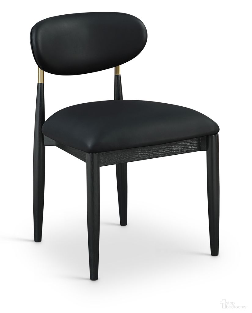 The appearance of Riccio Vegan Leather Upholstered Dining Side Chair Set of 2 In Black designed by Meridian in the modern / contemporary interior design. This black piece of furniture was selected by 1StopBedrooms from Riccio Collection to add a touch of cosiness and style into your home. Sku: 11017Black-SC. Material: Vegan Leather. Chair Type: Side Chair.