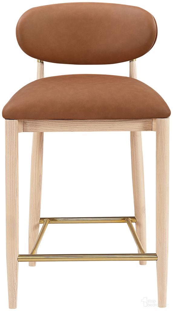 The appearance of Riccio Vegan Leather Upholstered Stool In Cognac and Stained Natural designed by Meridian in the modern / contemporary interior design. This cognac/stained natural piece of furniture was selected by 1StopBedrooms from Riccio Collection to add a touch of cosiness and style into your home. Sku: 11030Cognac-C. Material: Vegan Leather.