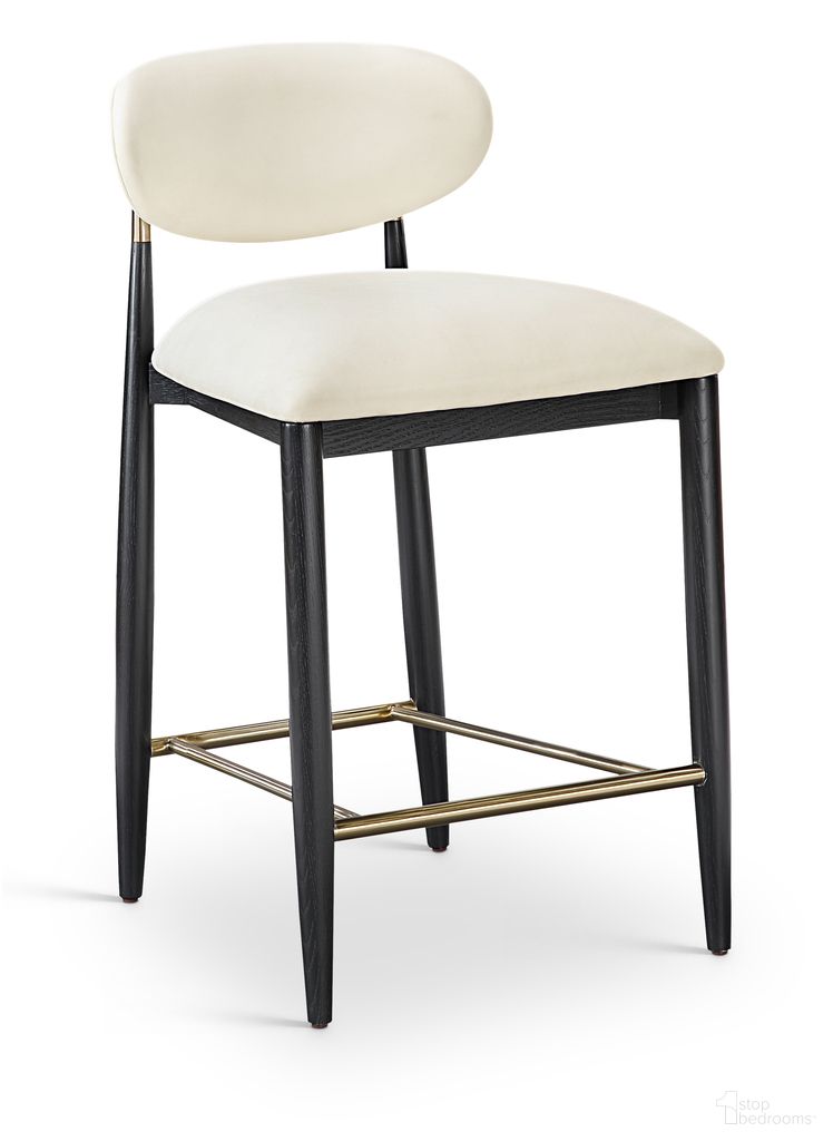 The appearance of Riccio Vegan Leather Upholstered Stool In Cream and Stained Black designed by Meridian in the modern / contemporary interior design. This cream/stained black piece of furniture was selected by 1StopBedrooms from Riccio Collection to add a touch of cosiness and style into your home. Sku: 11037Cream-C. Material: Vegan Leather.