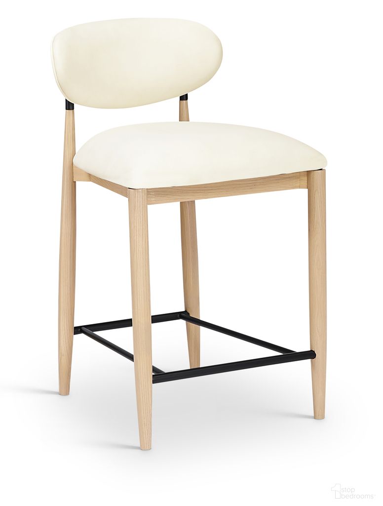 The appearance of Riccio Vegan Leather Upholstered Stool In Cream and Stained Natural designed by Meridian in the modern / contemporary interior design. This cream/stained natural piece of furniture was selected by 1StopBedrooms from Riccio Collection to add a touch of cosiness and style into your home. Sku: 11039Cream-C. Material: Vegan Leather.