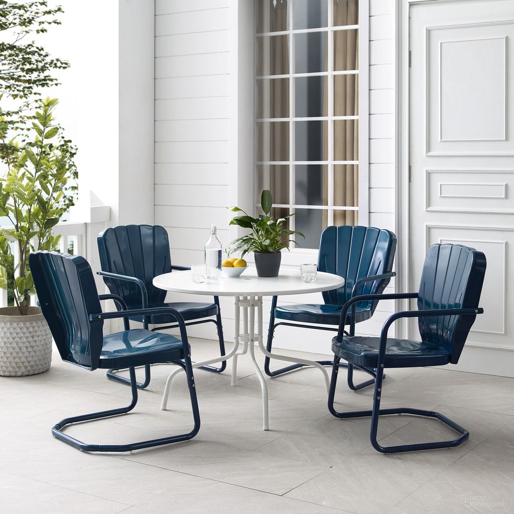 The appearance of Ridgeland 5 Piece Round Retro Outdoor Dining Set In Navy Gloss and White Satin designed by Crosley Brands in the transitional interior design. This navy piece of furniture was selected by 1StopBedrooms from Ridgeland Collection to add a touch of cosiness and style into your home. Sku: CO1012A-WH;CO1031-NV;CO1031-NV. Material: Steel.