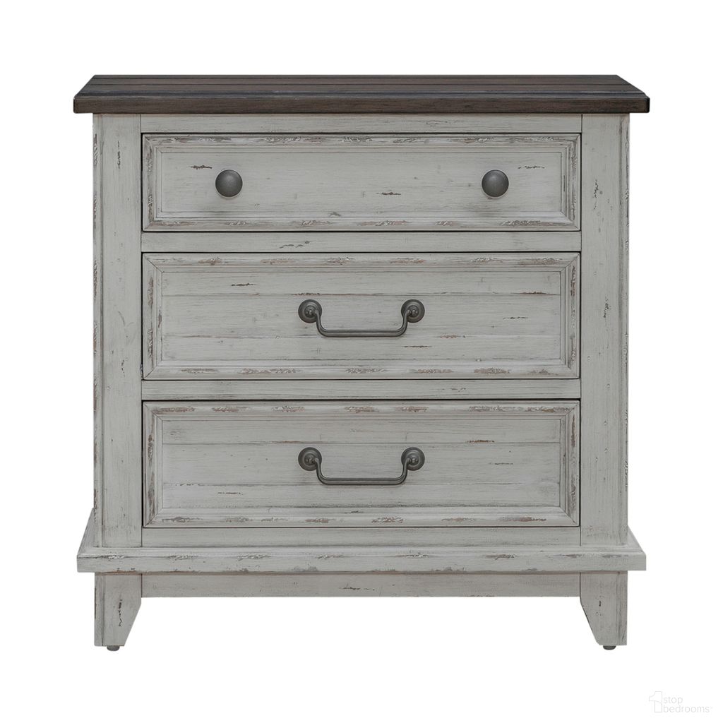 The appearance of River Place 3 Drawer Nightstand With Charging Station In Riverstone White and Tobacco designed by Liberty in the country / farmhouse interior design. This white piece of furniture was selected by 1StopBedrooms from River Place Collection to add a touch of cosiness and style into your home. Sku: 237-BR61. Material: Wood Veneer.