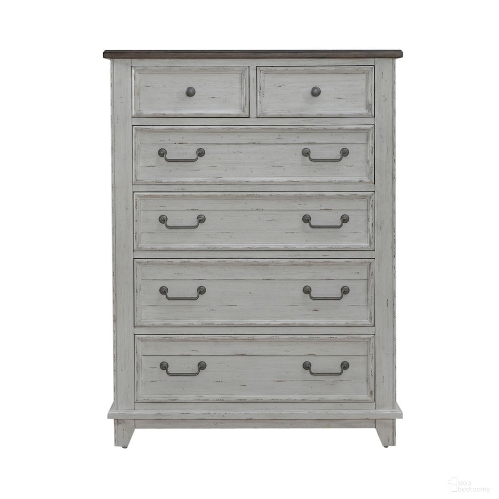 The appearance of River Place 6 Drawer Chest In Riverstone White and Tobacco designed by Liberty in the country / farmhouse interior design. This white piece of furniture was selected by 1StopBedrooms from River Place Collection to add a touch of cosiness and style into your home. Sku: 237-BR41. Material: Wood Veneer.