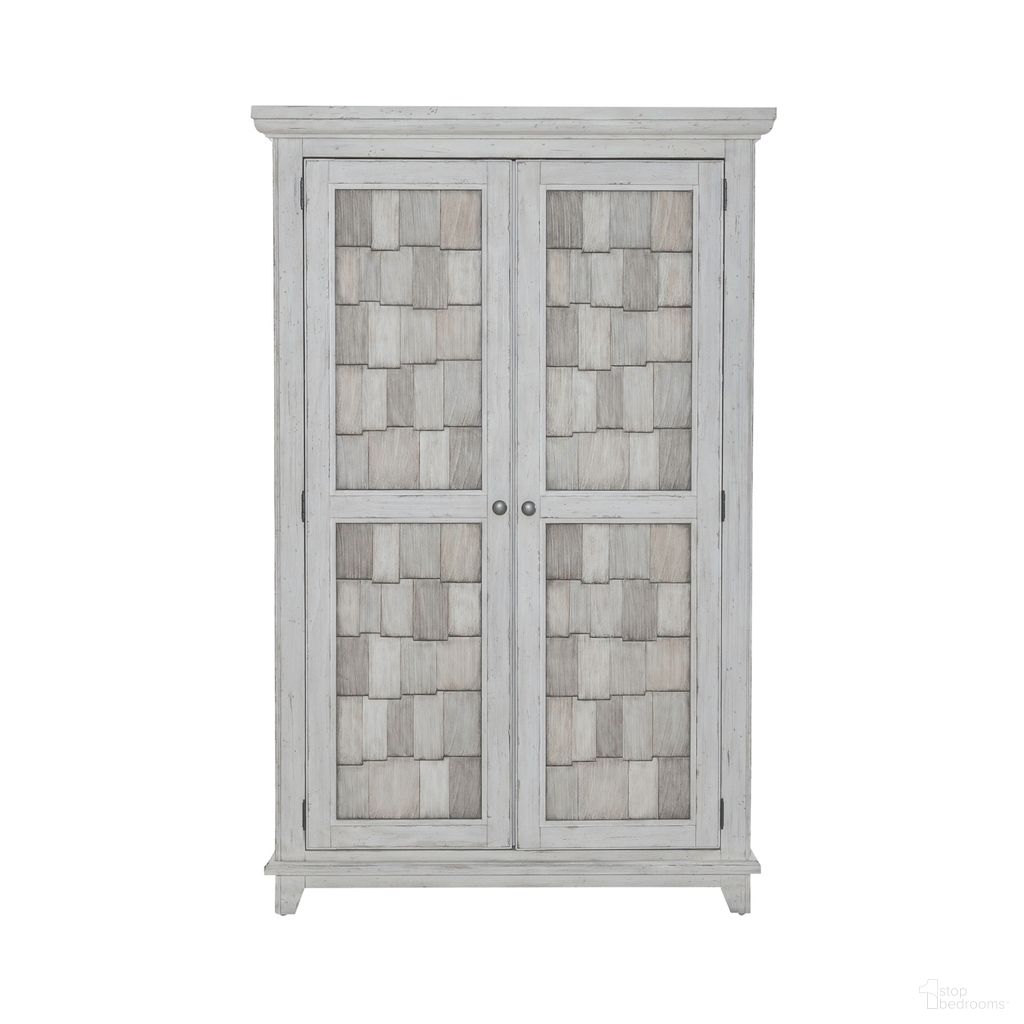 The appearance of River Place Armoire In Riverstone White and Tobacco designed by Liberty in the country / farmhouse interior design. This white piece of furniture was selected by 1StopBedrooms from River Place Collection to add a touch of cosiness and style into your home. Sku: 237-BR43. Material: Wood Veneer.