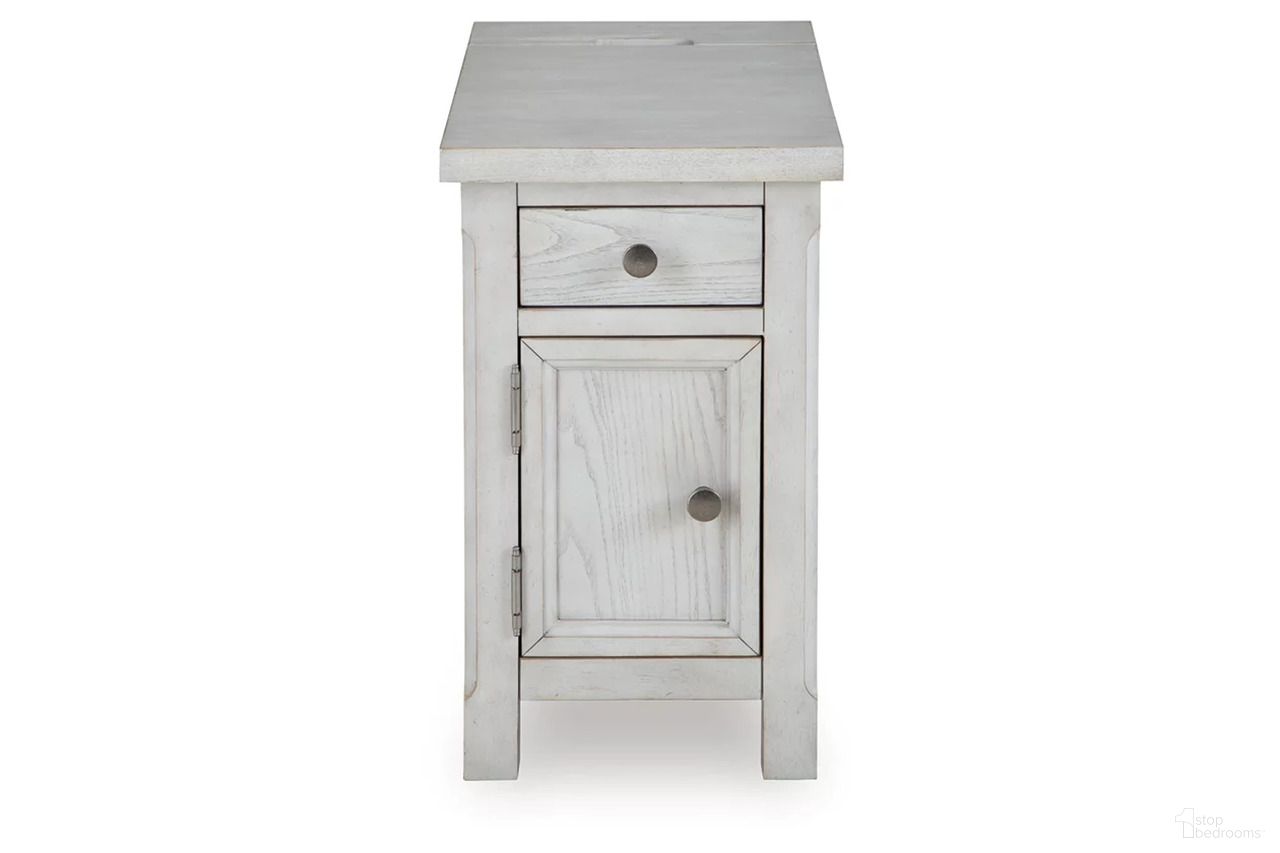 The appearance of Robbinsdale Chairside End Table In Antique White designed by Signature Design by Ashley in the transitional interior design. This antique white piece of furniture was selected by 1StopBedrooms from Robbinsdale Collection to add a touch of cosiness and style into your home. Sku: T729-7. Material: Wood.