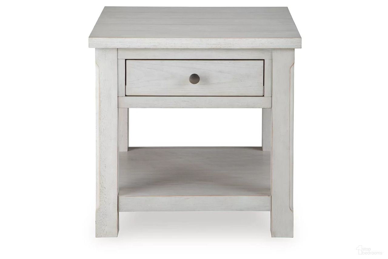 The appearance of Robbinsdale End Table In Antique White designed by Signature Design by Ashley in the transitional interior design. This antique white piece of furniture was selected by 1StopBedrooms from Robbinsdale Collection to add a touch of cosiness and style into your home. Sku: T729-2. Material: Wood.