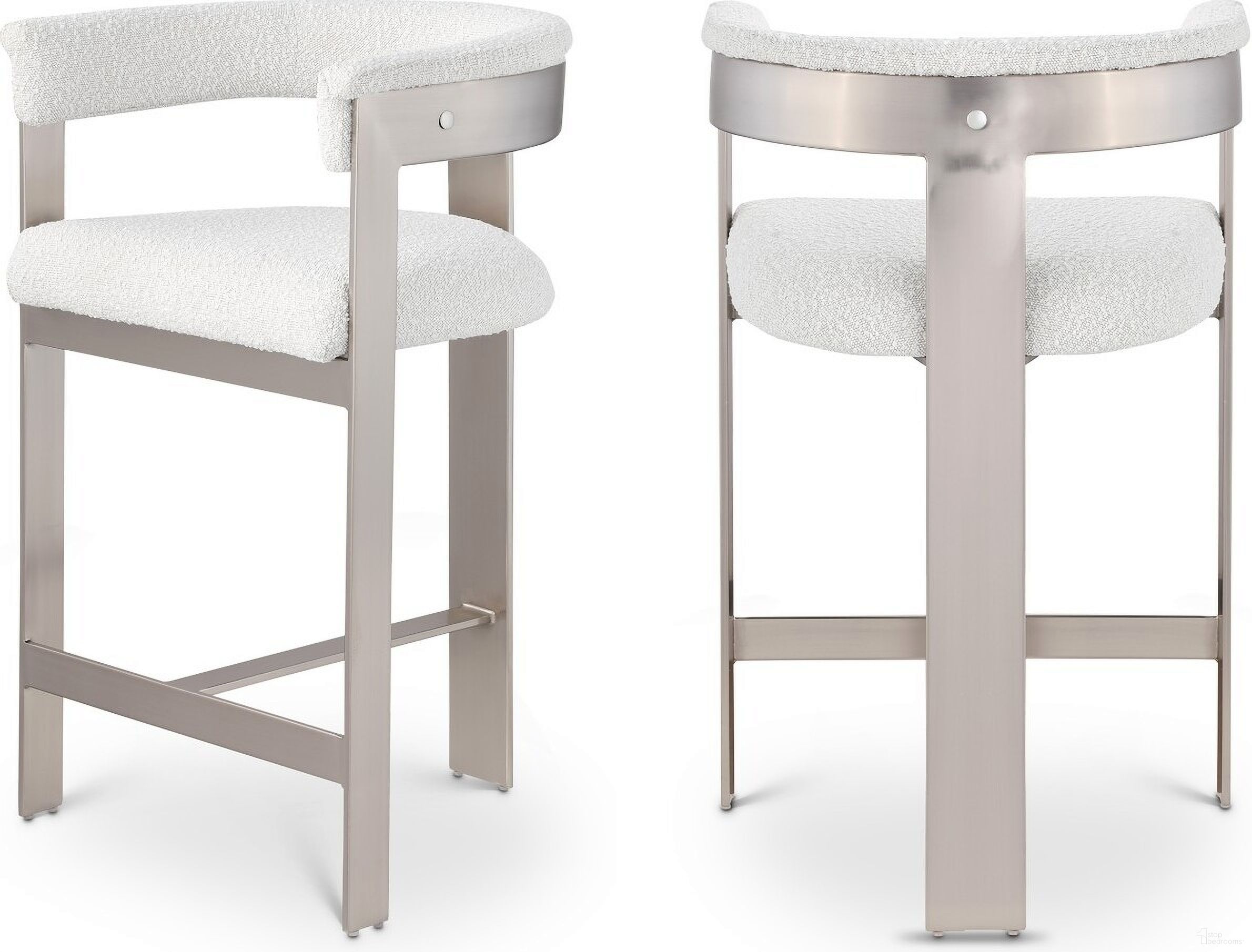 The appearance of Romeo Boucle Fabric Counter Stool Set of 2 In Cream/Brushed Chrome designed by Meridian in the modern / contemporary interior design. This cream piece of furniture was selected by 1StopBedrooms from Romeo Collection to add a touch of cosiness and style into your home. Sku: 739Cream-C. Material: Wood.