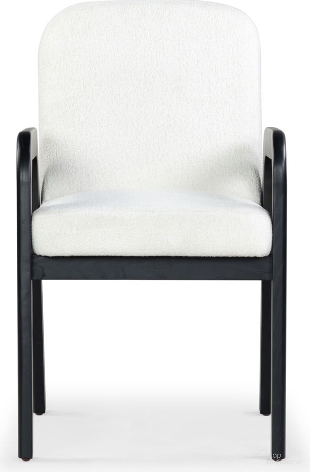 The appearance of Roslina Boucle Dining Chair In Ivory and Black designed by Safavieh Couture in the modern / contemporary interior design. This ivory/black piece of furniture was selected by 1StopBedrooms from Roslina Collection to add a touch of cosiness and style into your home. Sku: SFV6105A. Material: Wood. Chair Type: Arm Chair.