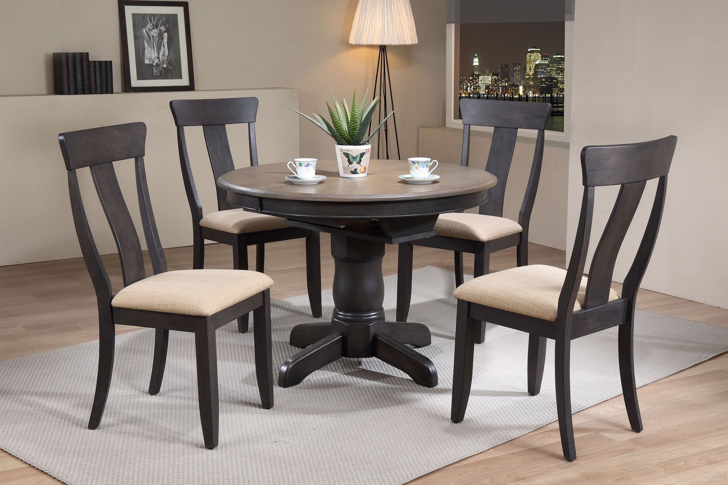The appearance of Round Panel Back Upholstered 5-Piece Dining Set In Grey Stone and Black Stone designed by Iconic Furniture in the transitional interior design. This grey stone and black stone piece of furniture was selected by 1StopBedrooms from Classics Collection to add a touch of cosiness and style into your home. Sku: RD42WCH57U97SBKS-5PC. Table Base Style: Pedestal. Table Top Shape: Round. Material: Rubberwood.