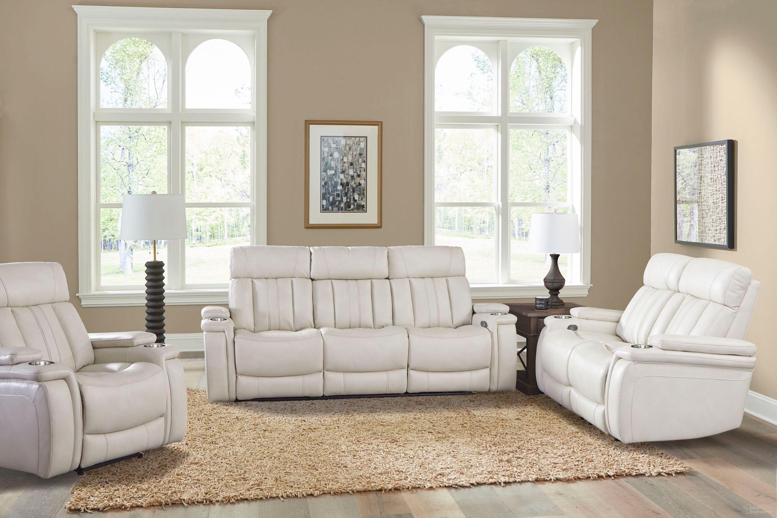 The appearance of Royce Fantom Ivory Power Reclining Living Room Set with Drop Down Console designed by Parker House in the traditional interior design. This cream piece of furniture  was selected by 1StopBedrooms from Royce Collection to add a touch of cosiness and style into your home. Sku: MROY#832PH-FNI;MROY#822PH-FNI. Material: Polyester.