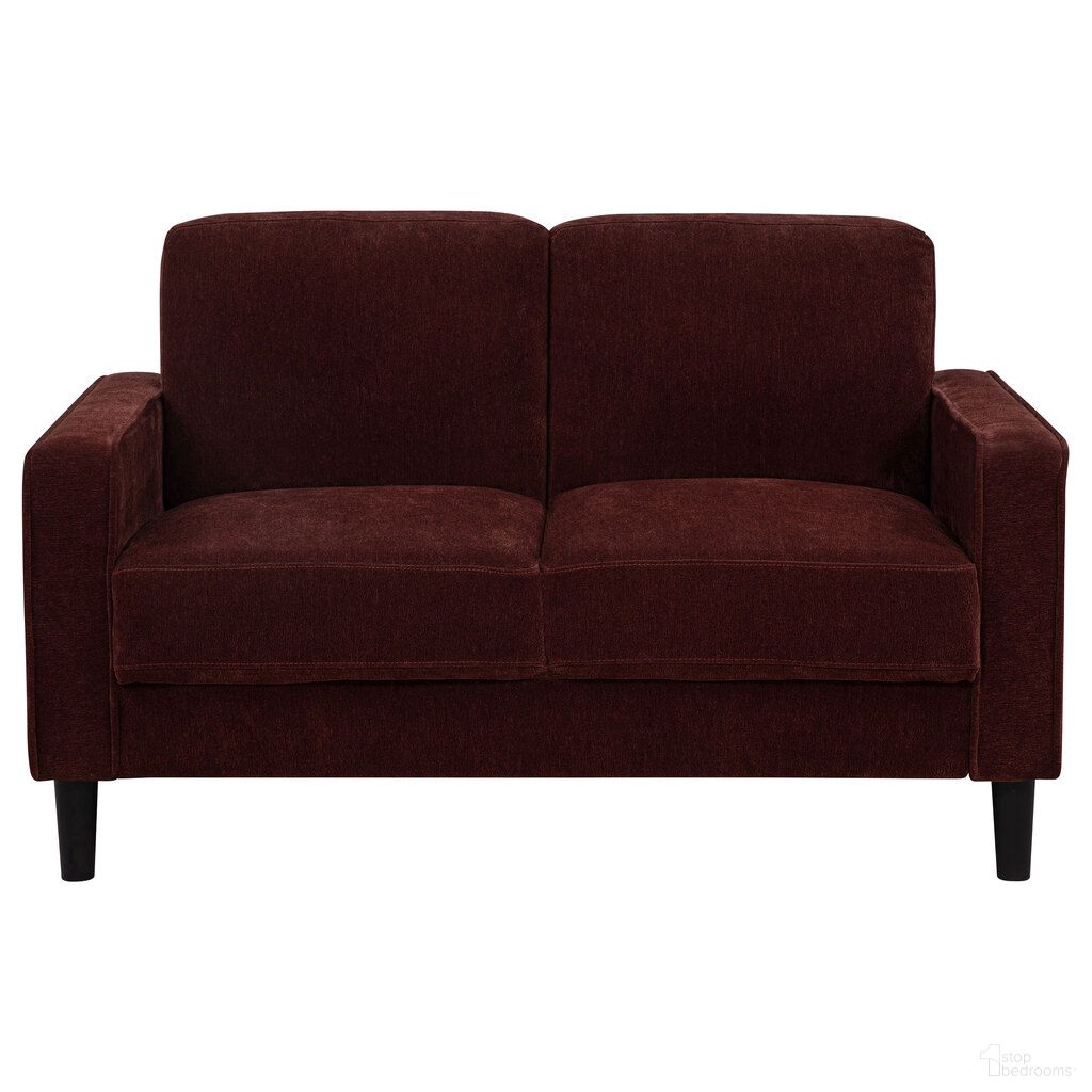 The appearance of Ruth Fabric Upholstered Track Arm Loveseat In Rust Red designed by Coaster in the transitional interior design. This rust red piece of furniture  was selected by 1StopBedrooms from Ruth Collection to add a touch of cosiness and style into your home. Sku: 511212. Material: Fabric.