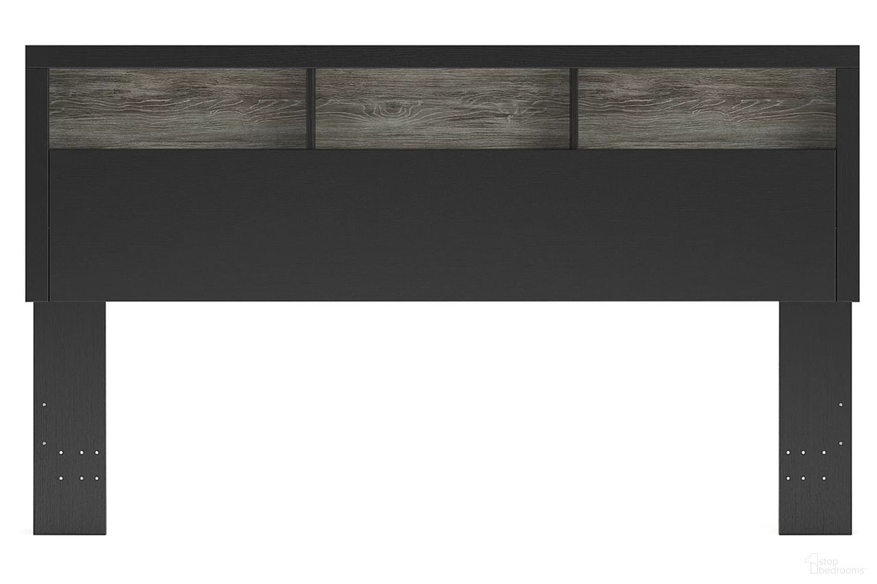 The appearance of Ryderton King Bookcase Headboard In Black and Gray designed by Signature Design by Ashley in the transitional interior design. This black and gray piece of furniture was selected by 1StopBedrooms from Ryderton Collection to add a touch of cosiness and style into your home. Sku: NCB1118-69. Material: Wood. Bed Size: King.