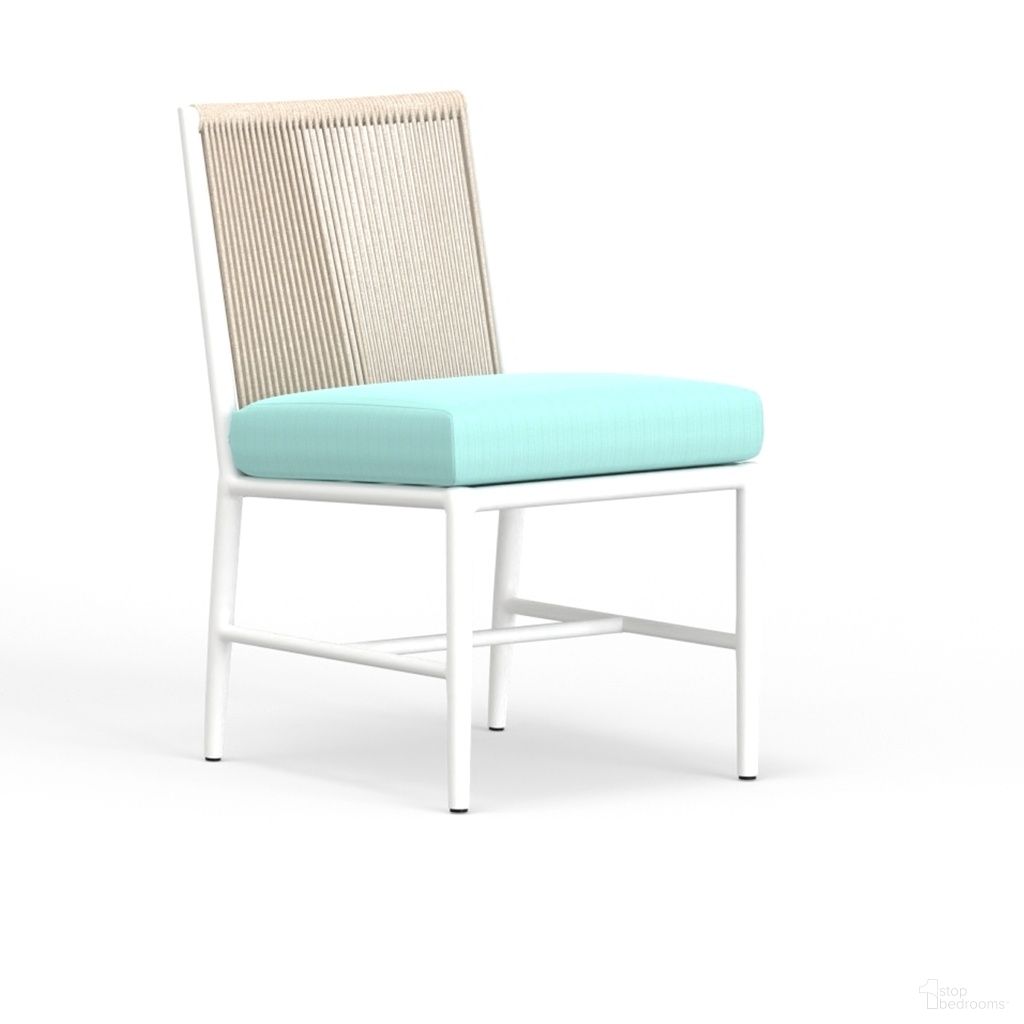 The appearance of Sabbia Armless Dining Chair in Dupione Celeste designed by Sunset West in the transitional interior design. This dupione celeste piece of furniture was selected by 1StopBedrooms from Sabbia Collection to add a touch of cosiness and style into your home. Sku: SW4901-1A-8067. Material: Olefin Rope.