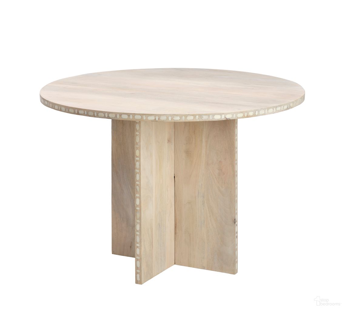 The appearance of Sama Round Bistro Dining Table In White Patina designed by Jamie Young Company in the transitional interior design. This white piece of furniture  was selected by 1StopBedrooms from Sama Collection to add a touch of cosiness and style into your home. Sku: 20SAMA-BINA. Table Base Style: Pedestal. Table Top Shape: Round. Size: 45". Material: Mango Wood.