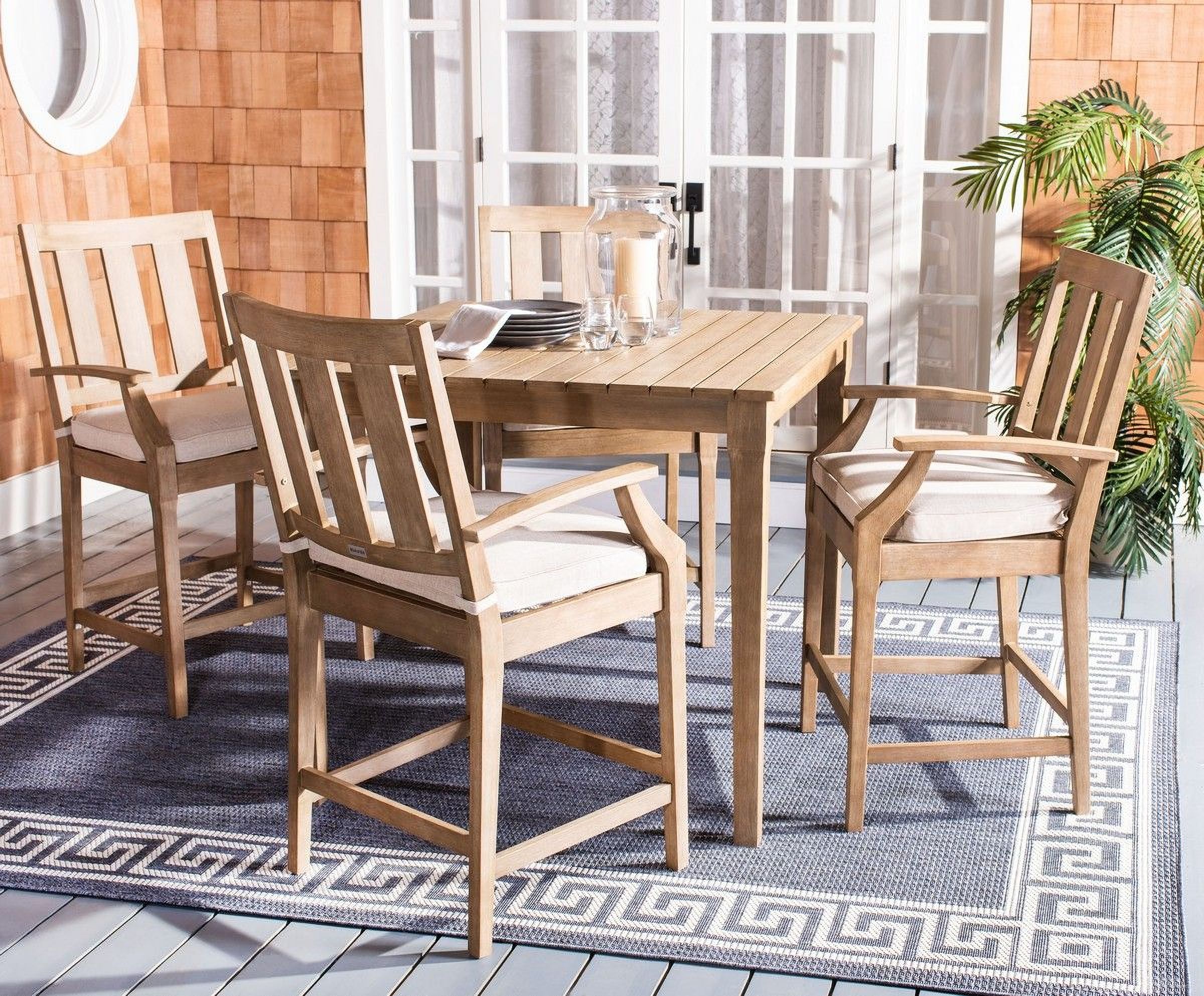 The appearance of San Salvador Natural Outdoor Patio Bar Set designed by Safavieh in the transitional interior design. This brown piece of furniture was selected by 1StopBedrooms from San Collection to add a touch of cosiness and style into your home. Sku: CPT1019A;CPT1020A-SET2. Material: Wood.