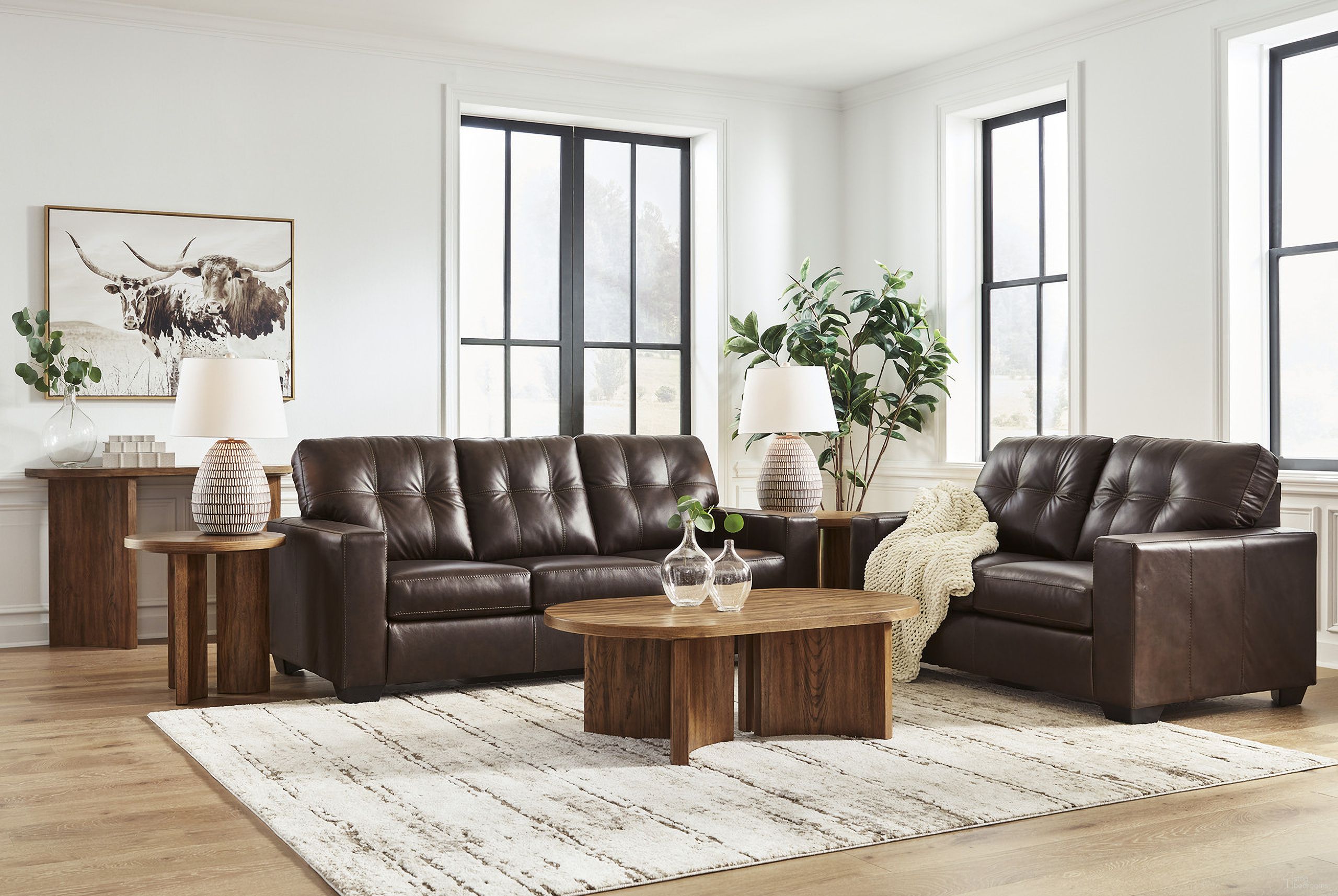 The appearance of Santorine Living Room Set In Dark Brown designed by Signature Design by Ashley in the modern / contemporary interior design. This dark brown piece of furniture  was selected by 1StopBedrooms from Santorine Collection to add a touch of cosiness and style into your home. Sku: 2170638;2170635. Material: Leather.