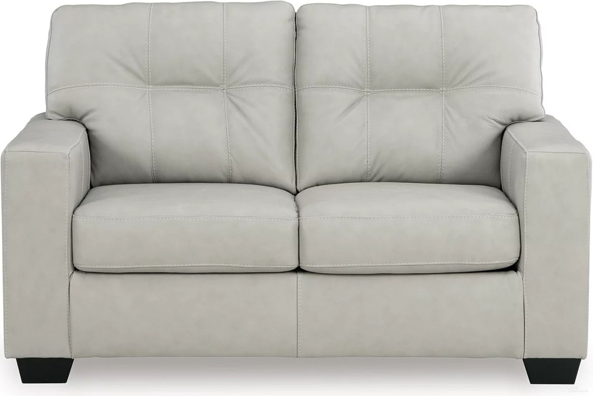 The appearance of Santorine Loveseat In Bone designed by Signature Design by Ashley in the modern / contemporary interior design. This bone piece of furniture  was selected by 1StopBedrooms from Santorine Collection to add a touch of cosiness and style into your home. Sku: 2170835. Material: Faux Leather.