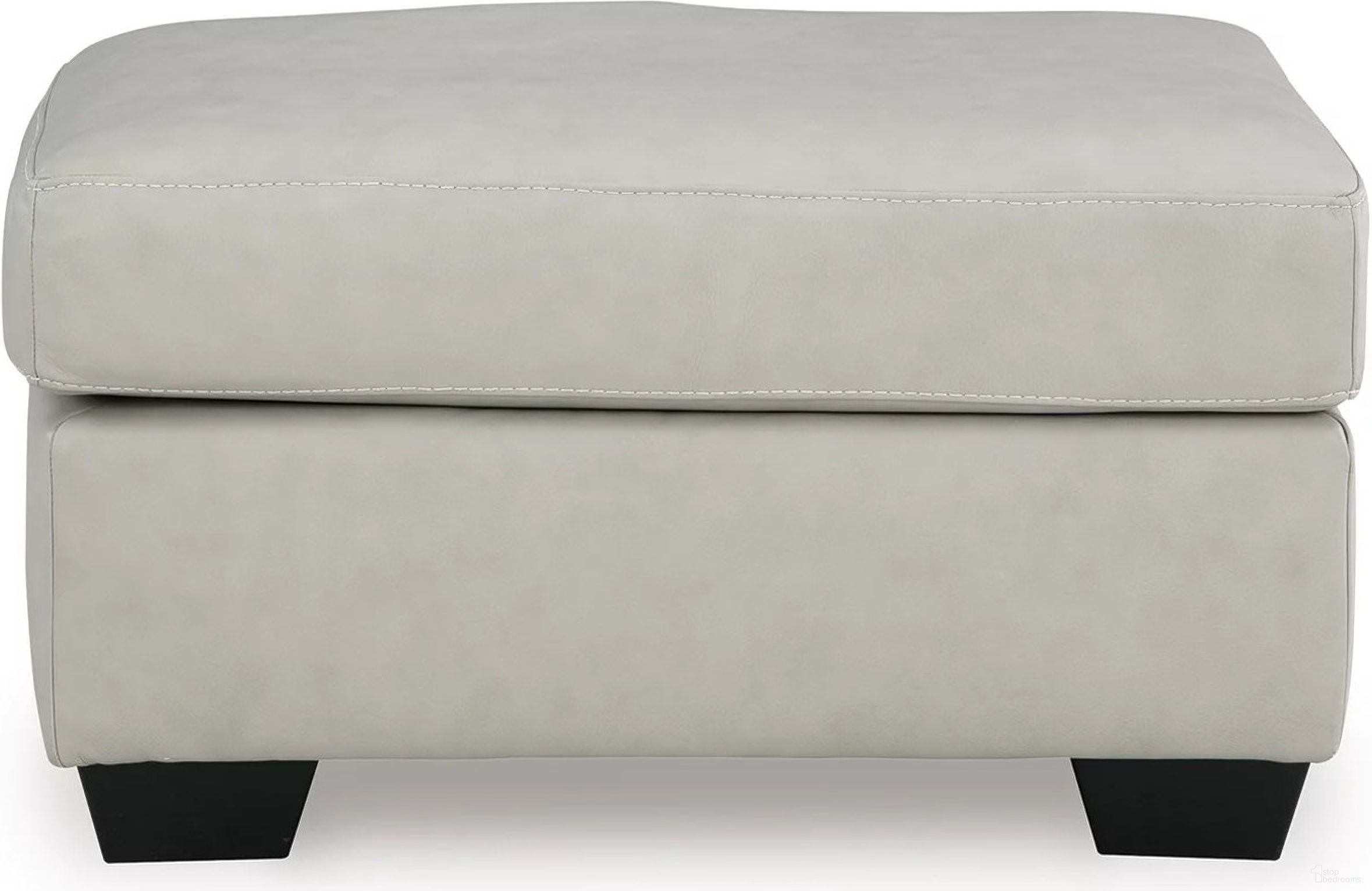 The appearance of Santorine Ottoman In Bone designed by Signature Design by Ashley in the modern / contemporary interior design. This bone piece of furniture  was selected by 1StopBedrooms from Santorine Collection to add a touch of cosiness and style into your home. Sku: 2170814. Material: Faux Leather.