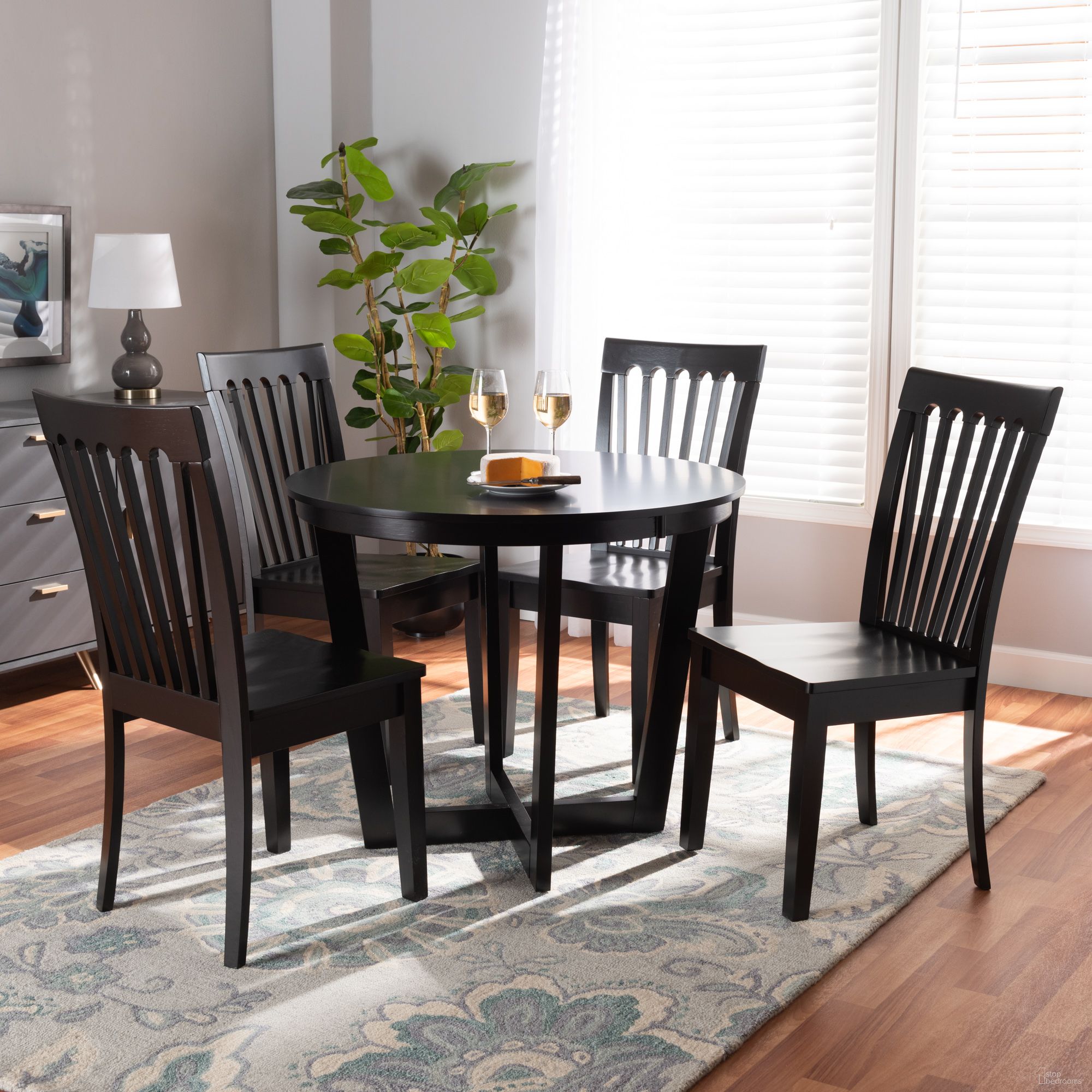 The appearance of Sasa Wood 5-Piece Dining Set In Dark Brown designed by Baxton Studio in the modern / contemporary interior design. This dark brown piece of furniture was selected by 1StopBedrooms from Sasa Collection to add a touch of cosiness and style into your home. Sku: Sasa-Dark Brown-5PC Dining Set. Table Base Style: Pedestal. Table Top Shape: Round. Size: 35". Material: Oak Wood.