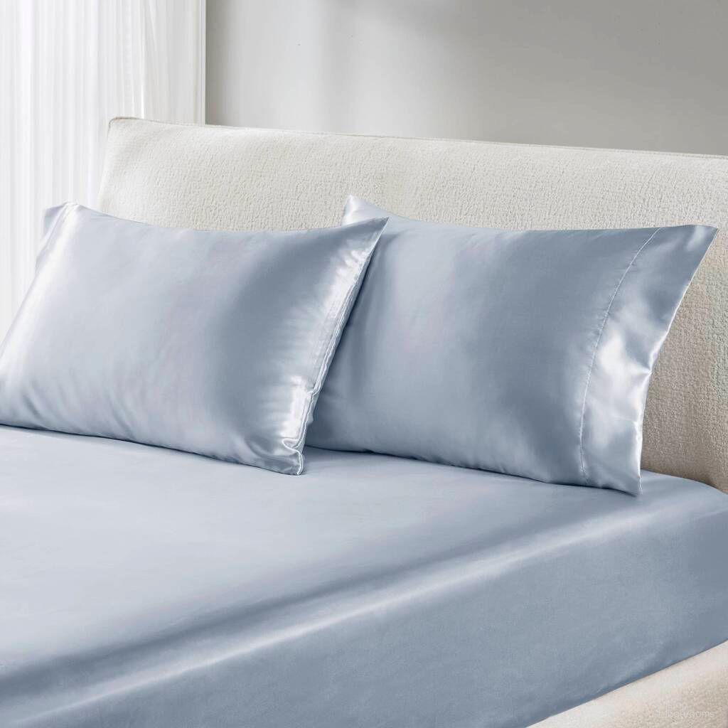 The appearance of Satin Luxury 2 Pc Pillowcases In Blue designed by Olliix in the transitional interior design. This blue piece of furniture was selected by 1StopBedrooms from Satin Collection to add a touch of cosiness and style into your home. Sku: MPE21-1136. Material: Polyester. Bed Size: King.