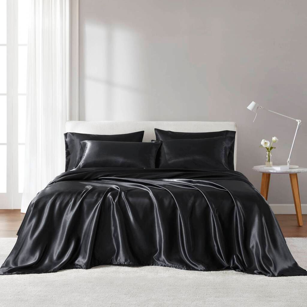 The appearance of Satin Luxury Sheet Set In Black designed by Olliix in the transitional interior design. This black piece of furniture was selected by 1StopBedrooms from Satin Collection to add a touch of cosiness and style into your home. Sku: MPE20-1110. Material: Polyester. Bed Size: Split King.