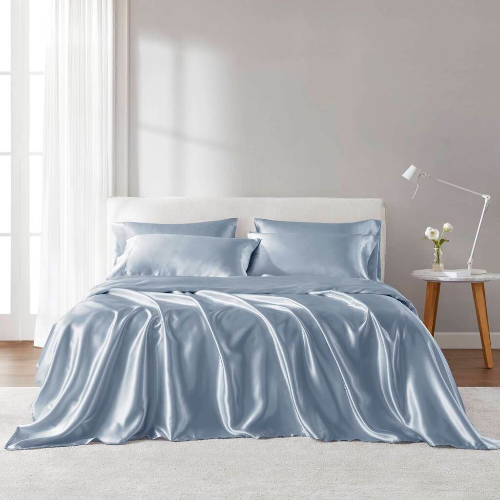 The appearance of Satin Luxury Sheet Set In Blue designed by Olliix in the transitional interior design. This blue piece of furniture  was selected by 1StopBedrooms from Satin Collection to add a touch of cosiness and style into your home. Sku: MPE20-1130. Material: Polyester. Bed Size: Twin.