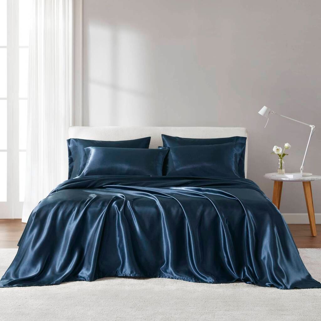The appearance of Satin Luxury Sheet Set In Midnight Blue designed by Olliix in the transitional interior design. This midnight blue piece of furniture was selected by 1StopBedrooms from Satin Collection to add a touch of cosiness and style into your home. Sku: MPE20-1141. Material: Polyester. Bed Size: California King.