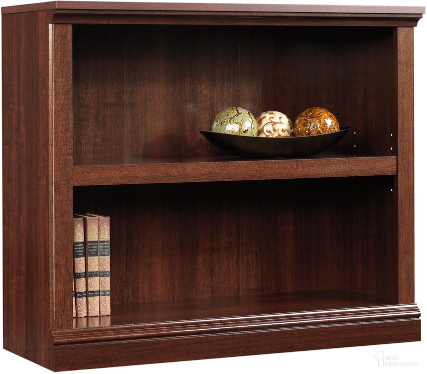 The appearance of 2-Shelf Bookcase In Select Cherry designed by Sauder in the transitional interior design. This select cherry piece of furniture  was selected by 1StopBedrooms from Sauder Select Collection to add a touch of cosiness and style into your home. Sku: 414238. Material: Engineered Wood.