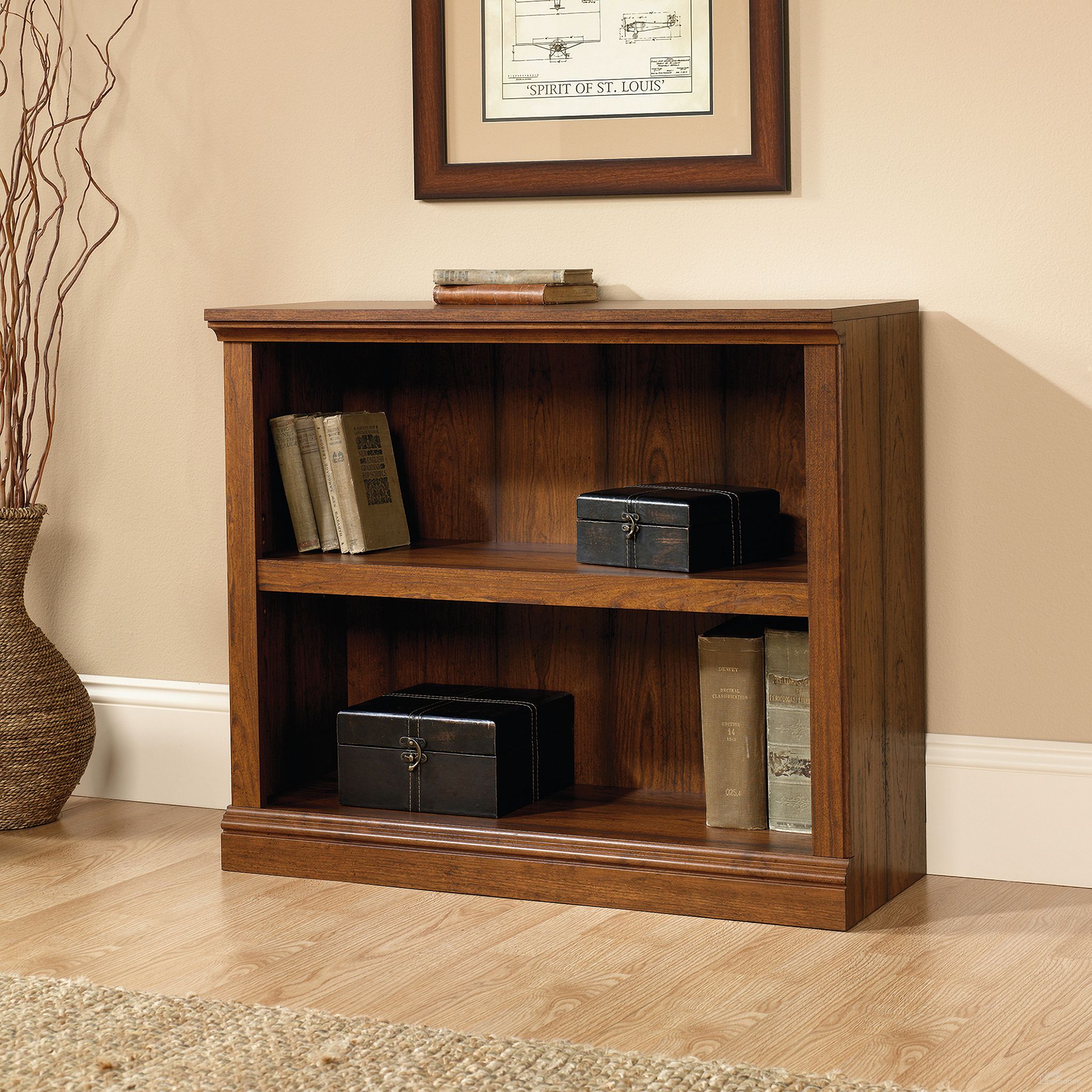 The appearance of Sauder Select 2-Shelf Bookcase In Washington Cherry designed by Sauder in the transitional interior design. This washington cherry piece of furniture was selected by 1StopBedrooms from Sauder Select Collection to add a touch of cosiness and style into your home. Sku: 413792. Material: Engineered Wood.