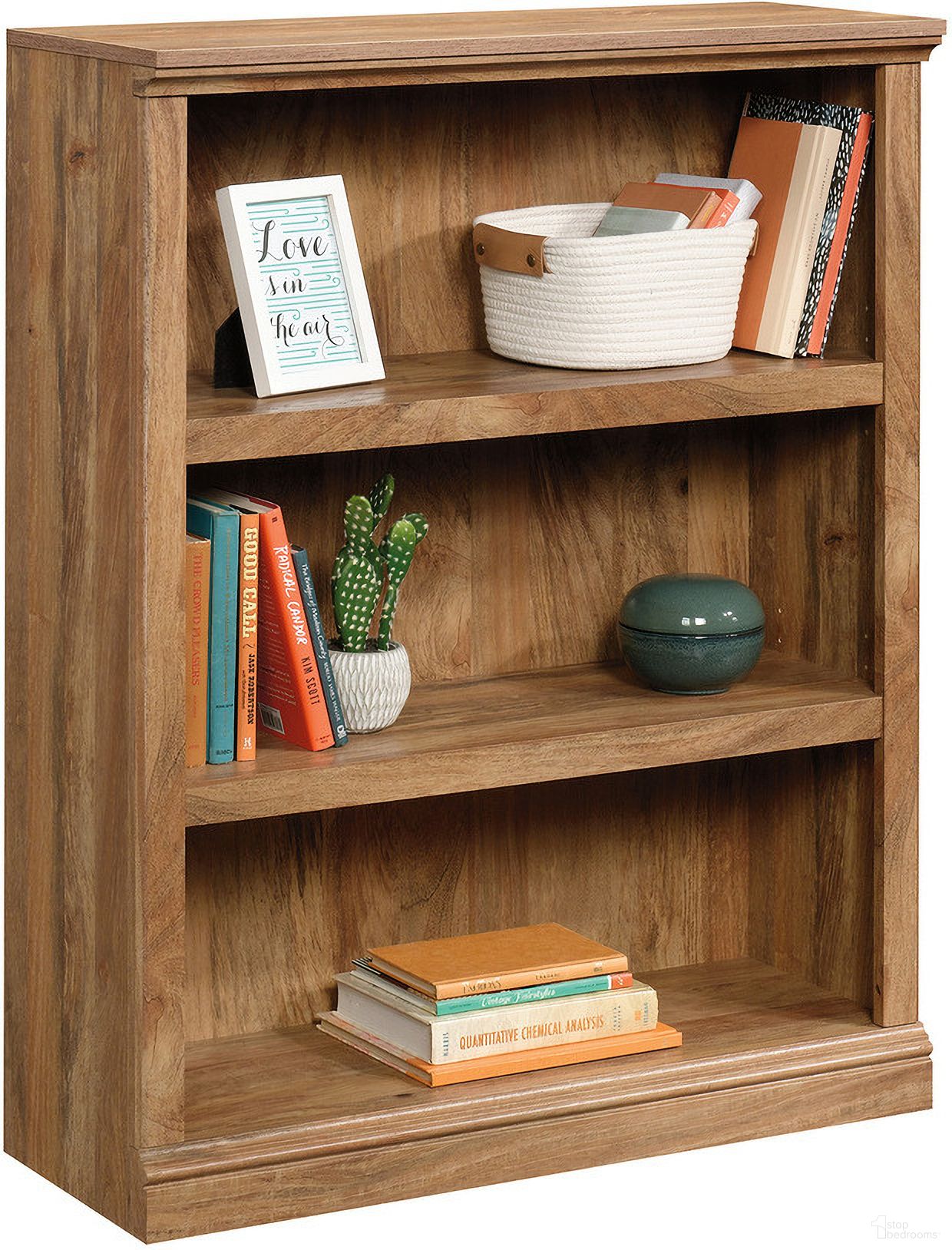The appearance of Sauder Select 3-Shelf Bookcase In Sindoori Mango designed by Sauder in the transitional interior design. This sindoori mango piece of furniture  was selected by 1StopBedrooms from Sauder Select Collection to add a touch of cosiness and style into your home. Sku: 426416. Material: Engineered Wood.
