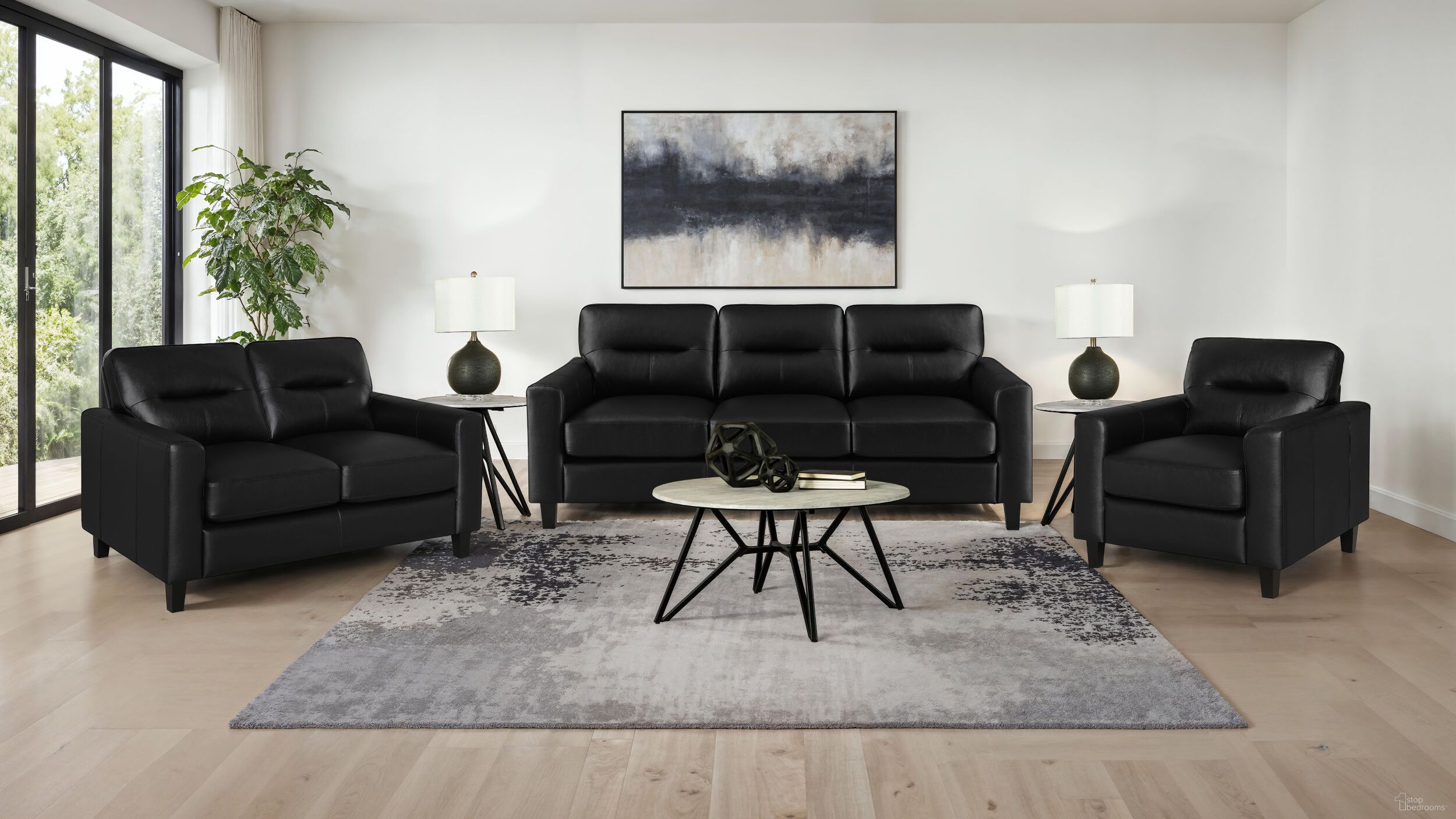 The appearance of Scotland Faux Leather Upholstered Track Arm Living Room Set In Black designed by Coaster in the transitional interior design. This black piece of furniture  was selected by 1StopBedrooms from Scotland Collection to add a touch of cosiness and style into your home. Sku: 504664;504665. Material: Faux Leather.