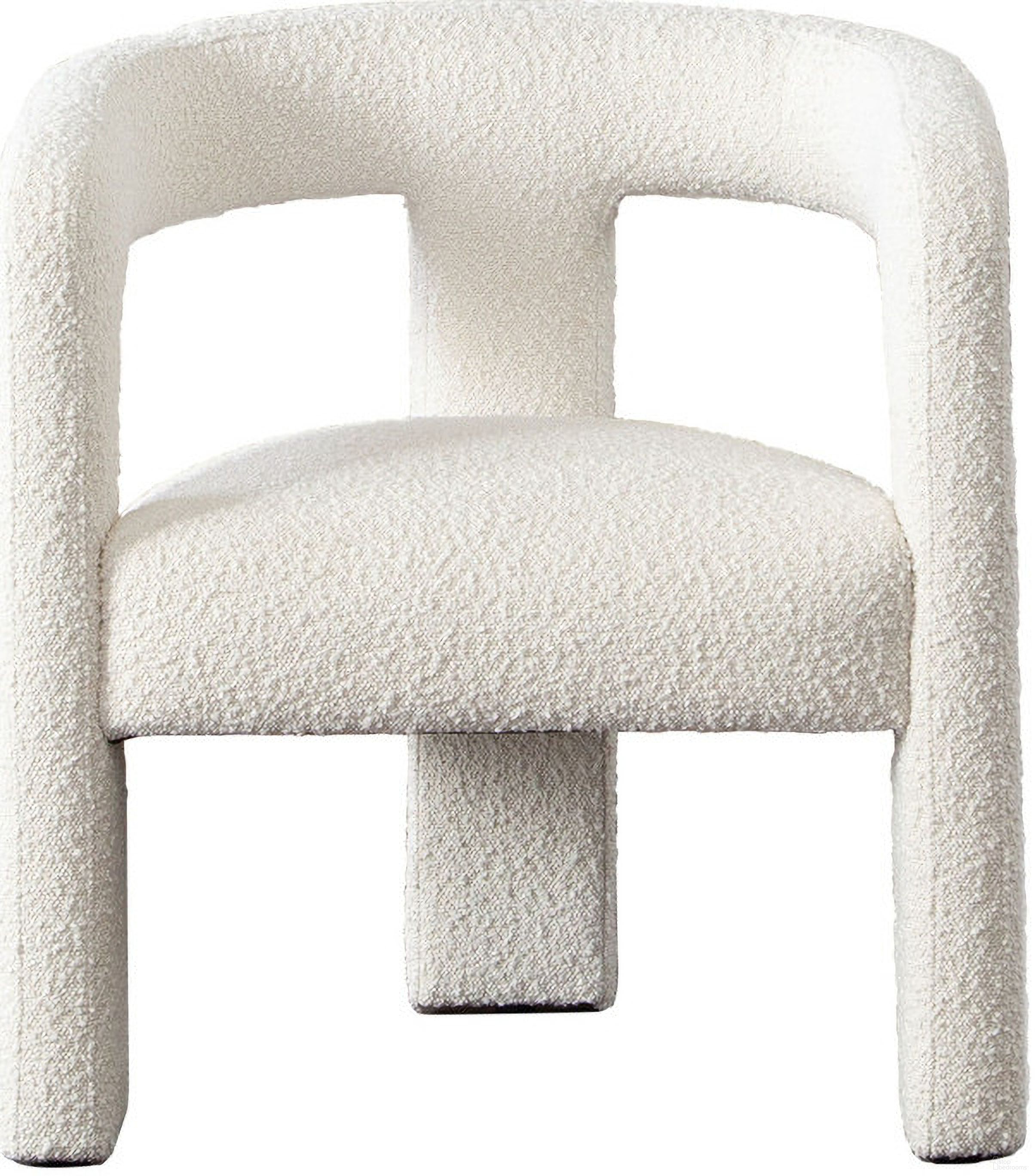 The appearance of Scout Dining Chair In Ivory Boucle Fabric designed by Diamond Sofa in the modern / contemporary interior design. This ivory piece of furniture  was selected by 1StopBedrooms from Scout Collection to add a touch of cosiness and style into your home. Sku: SCOUTCHIV. Material: Fabric. Chair Type: Arm Chair.