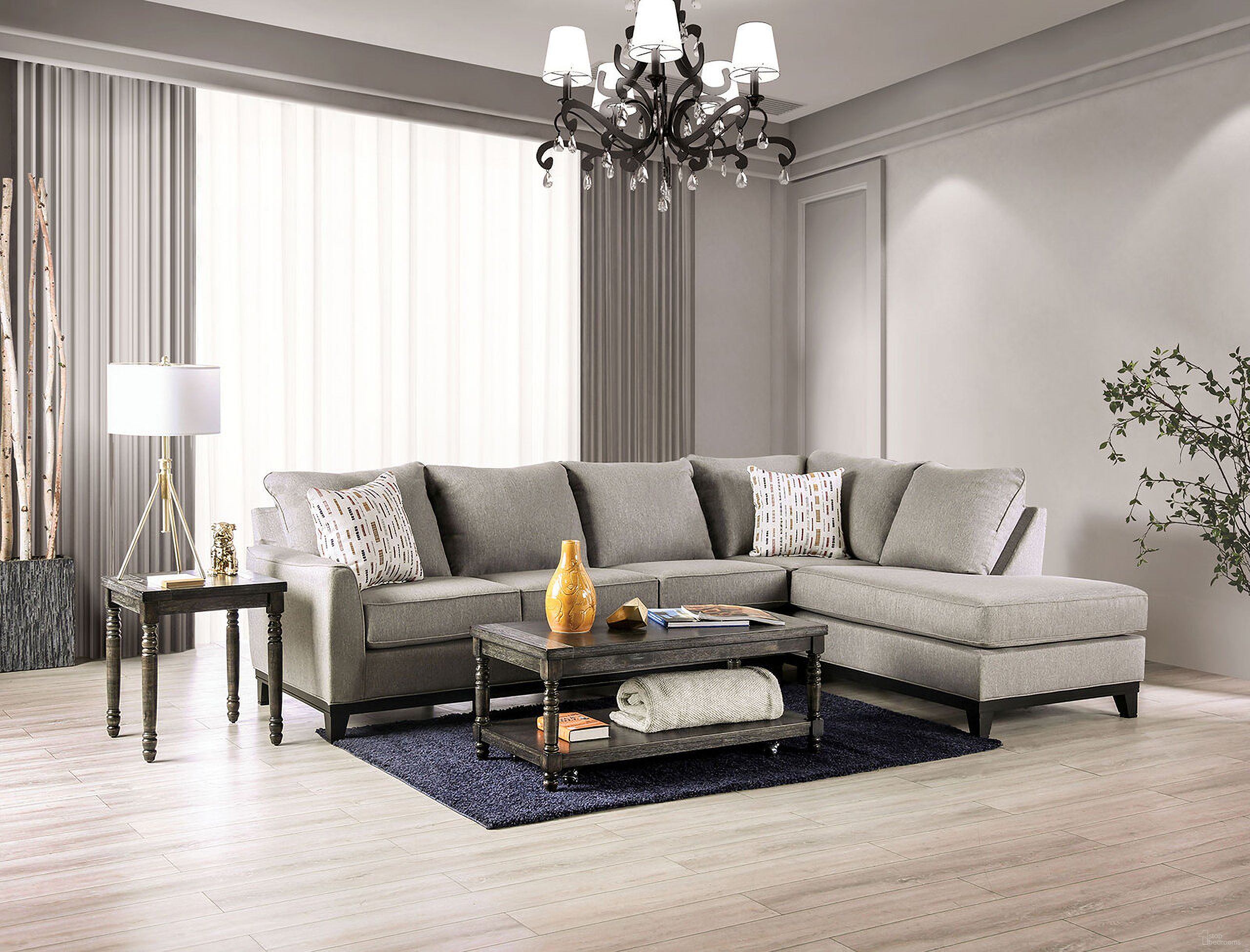 The appearance of Sectional In Light Gray designed by Furniture of America in the transitional interior design. This light gray piece of furniture was selected by 1StopBedrooms from to add a touch of cosiness and style into your home. Sku: SM1118-LAF;SM1118-RAF. Material: Linen. Layout: L-Shape.