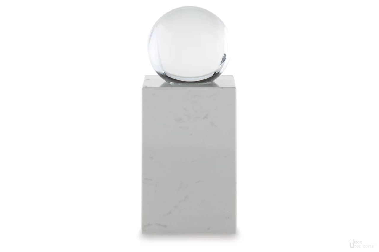 The appearance of Sellner Sculpture In White/Clear designed by Signature Design by Ashley in the modern / contemporary interior design. This white/clear piece of furniture  was selected by 1StopBedrooms from Sellner Collection to add a touch of cosiness and style into your home. Sku: A2000778. Material: Marble.