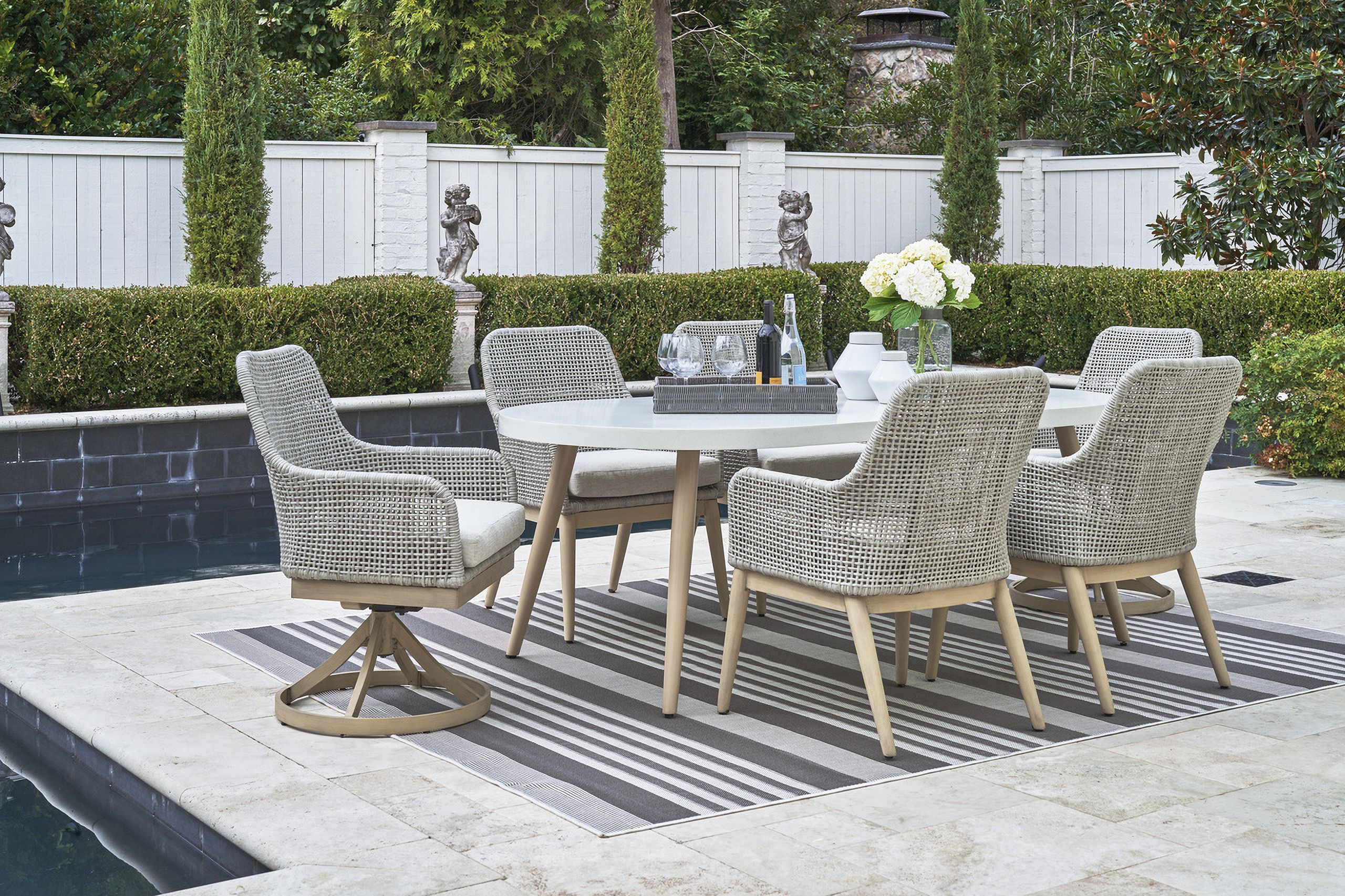 The appearance of Seton Creek White Outdoor Dining Room Set designed by Signature Design by Ashley in the transitional interior design. This white piece of furniture was selected by 1StopBedrooms from Seton Creek Collection to add a touch of cosiness and style into your home. Sku: P798-625;P798-601A. Material: Metal.