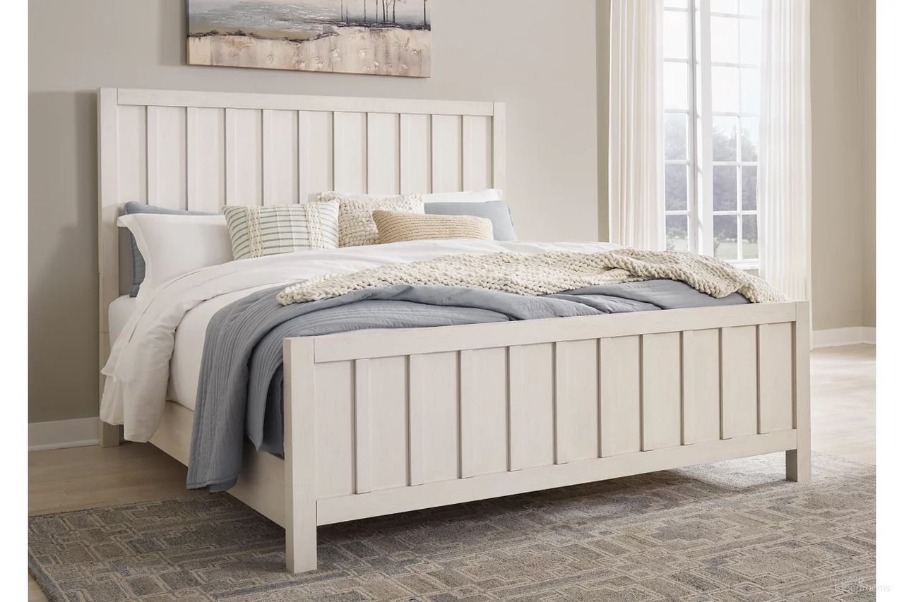 The appearance of Shaybrock King Panel Bed In Antique White designed by Signature Design by Ashley in the transitional interior design. This antique white piece of furniture  was selected by 1StopBedrooms from Shaybrock Collection to add a touch of cosiness and style into your home. Sku: B683-82;B683-97. Bed Type: Panel Bed. Material: Wood. Bed Size: King.