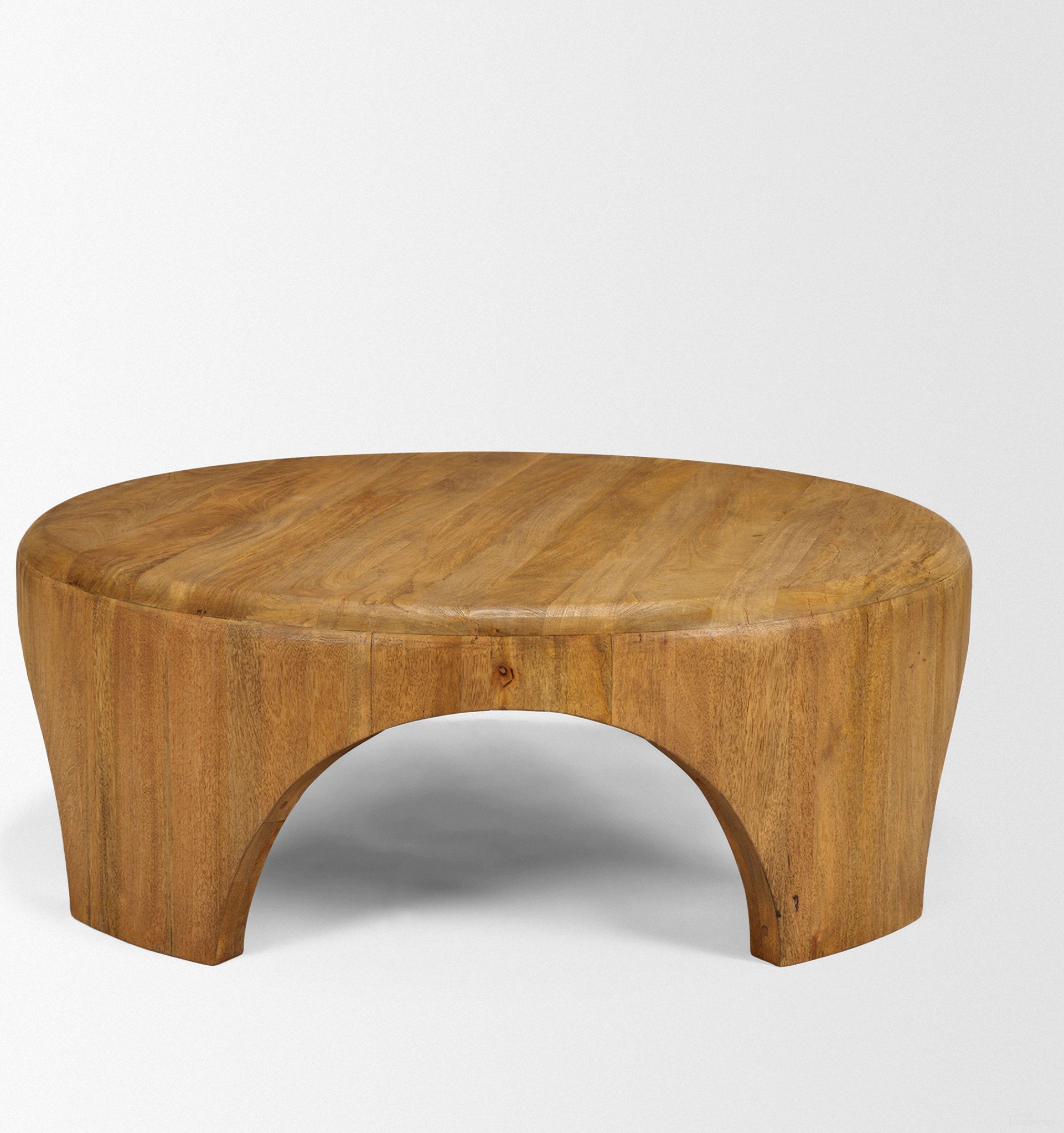 The appearance of Shima Round Wood with Arched Legs Coffee Table In Light Brown designed by Mercana in the transitional interior design. This light brown piece of furniture  was selected by 1StopBedrooms from Shima Collection to add a touch of cosiness and style into your home. Sku: 70867. Material: Solid Wood.