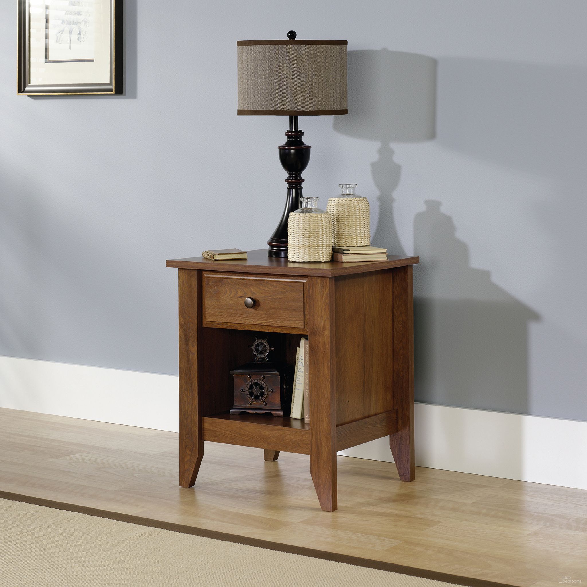 The appearance of Shoal Creek Night Stand In Oiled Oak designed by Sauder in the transitional interior design. This oiled oak piece of furniture was selected by 1StopBedrooms from Shoal Creek Collection to add a touch of cosiness and style into your home. Sku: 410412. Material: Engineered Wood.