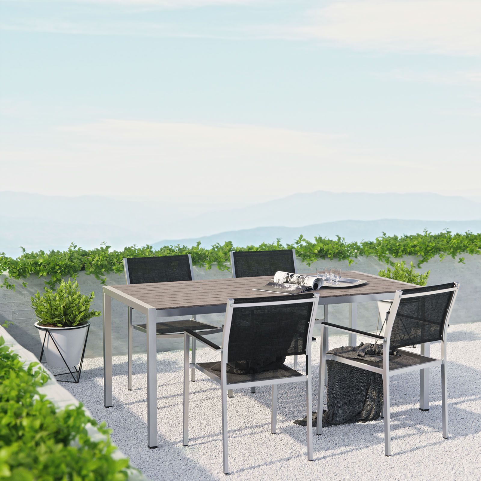 The appearance of Shore Silver and Black 5 Piece Outdoor Patio Aluminum Dining Set EEI-2483-SLV-BLK-SET designed by Modway in the modern / contemporary interior design. This silver and black piece of furniture  was selected by 1StopBedrooms from Shore Collection to add a touch of cosiness and style into your home. Sku: EEI-2251-SLV-GRY;EEI-2272-SLV-BLK;EEI-2272-SLV-BLK. Table Base Style: Legs. Material: Wood. Table Top Shape: Rectangular.