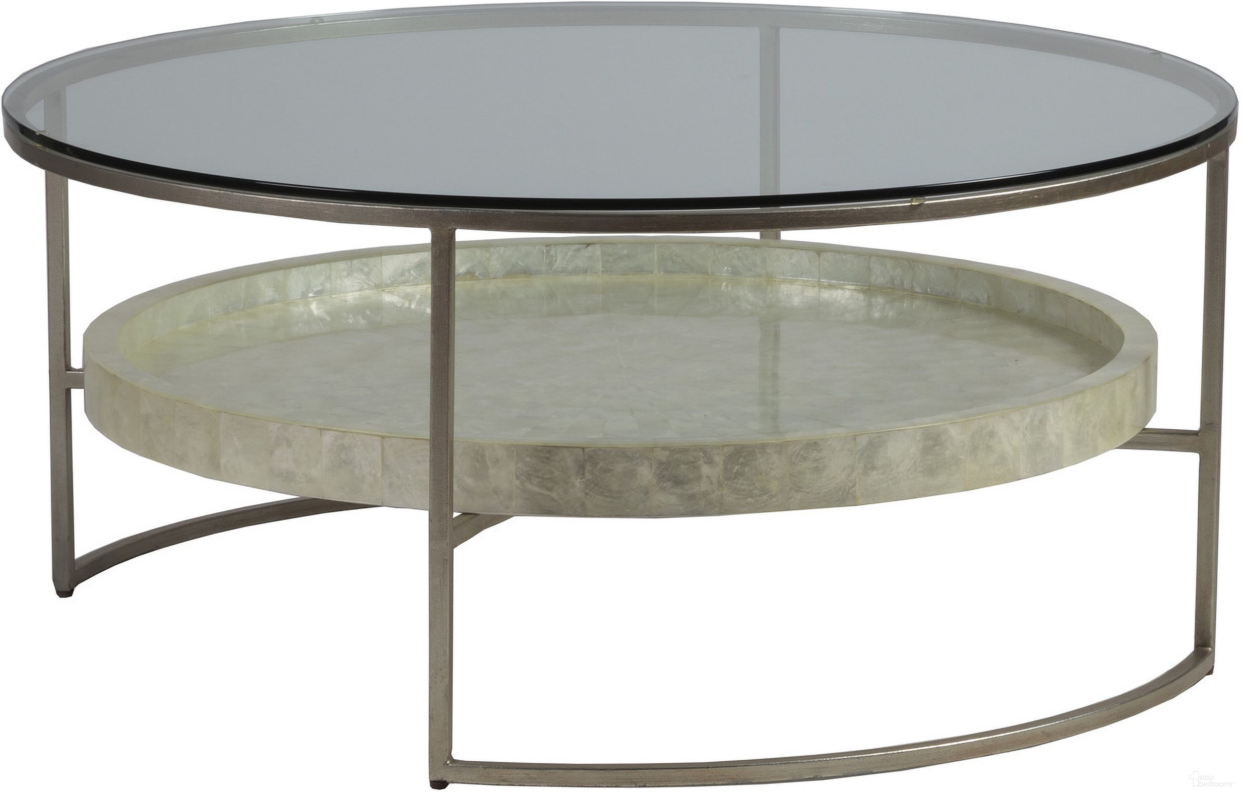 The appearance of Signature Designs Cumulus Capiz Round Cocktail Table In Champagne designed by Artistica Home in the modern / contemporary interior design. This champagne piece of furniture was selected by 1StopBedrooms from Signature Designs Collection to add a touch of cosiness and style into your home. Sku: 2156-943C. Material: Metal.