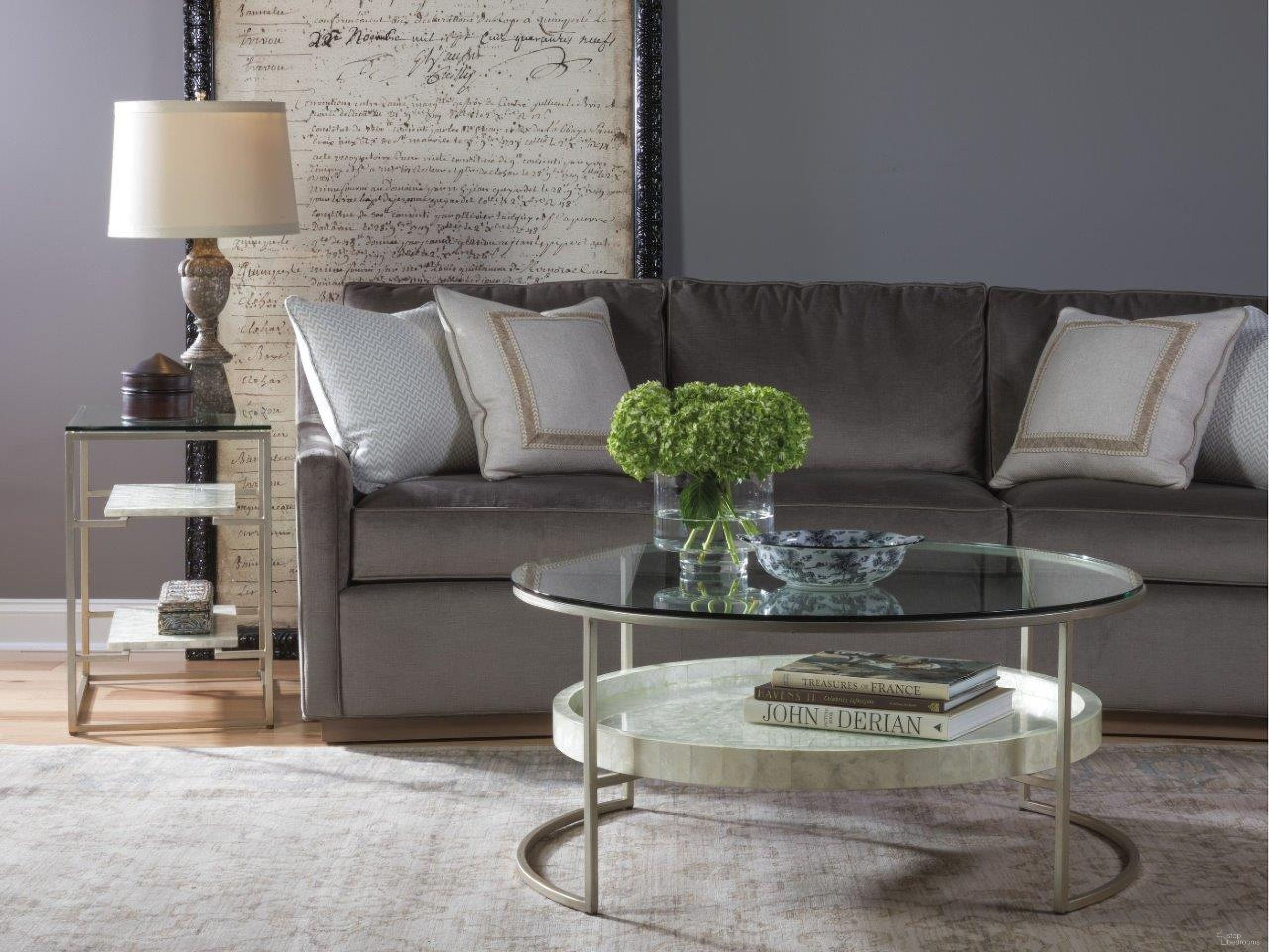 The appearance of Signature Designs Champagne Cumulus Capiz Round Occasional Table Set designed by Artistica Home in the transitional interior design. This champagne piece of furniture was selected by 1StopBedrooms from Signature Designs Collection to add a touch of cosiness and style into your home. Sku: 2156-943C;2203-953. Material: Metal.