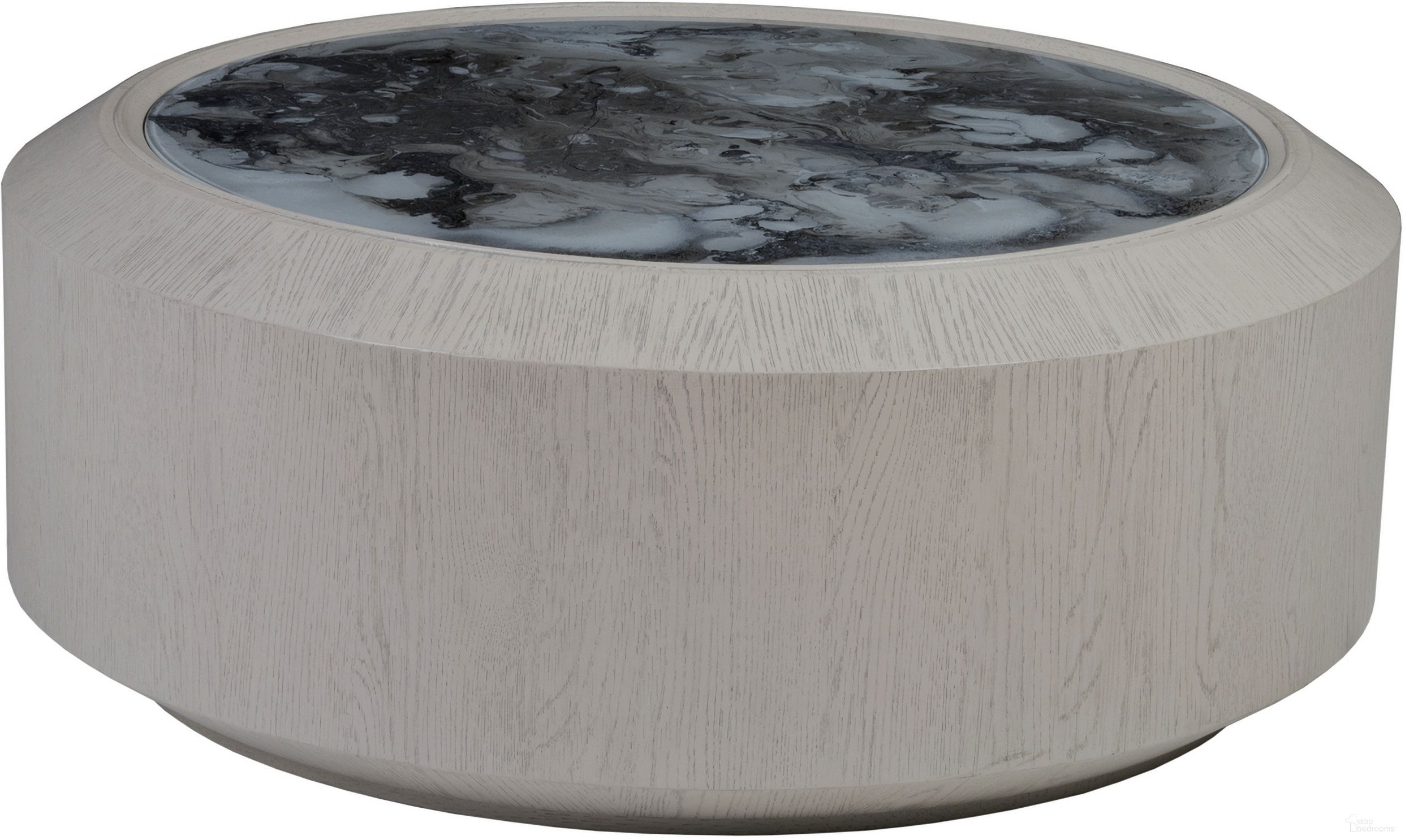 The appearance of Signature Designs Metaphor Round Cocktail Table In Light Gray designed by Artistica Home in the modern / contemporary interior design. This light gray piece of furniture  was selected by 1StopBedrooms from Signature Designs Collection to add a touch of cosiness and style into your home. Sku: 2208-943C. Material: Wood.